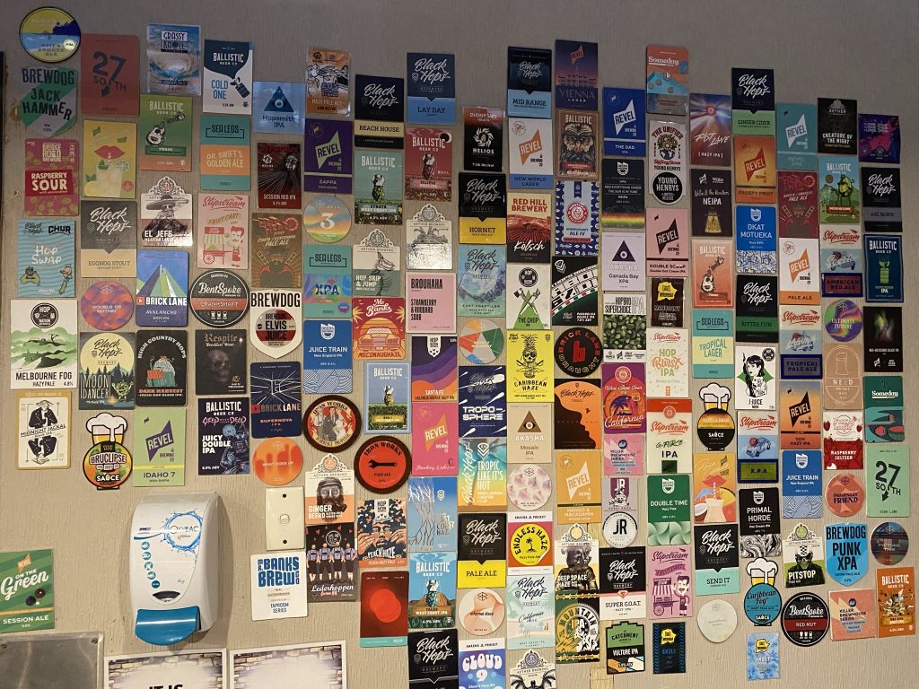 A wall of beer decals
